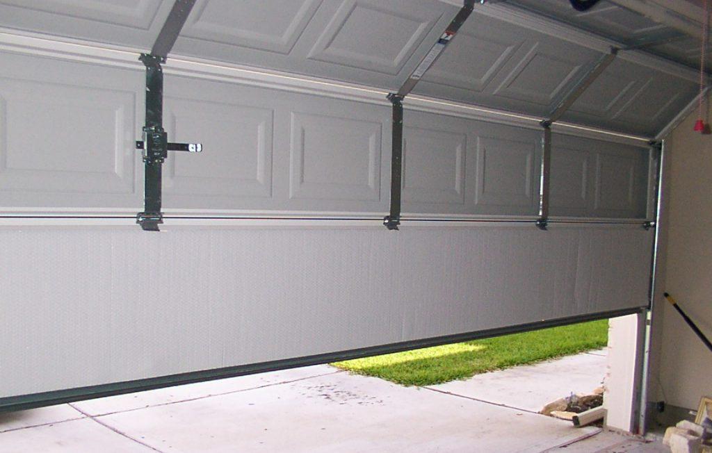Repairing Dents and Damage in Your Garage Door Panels